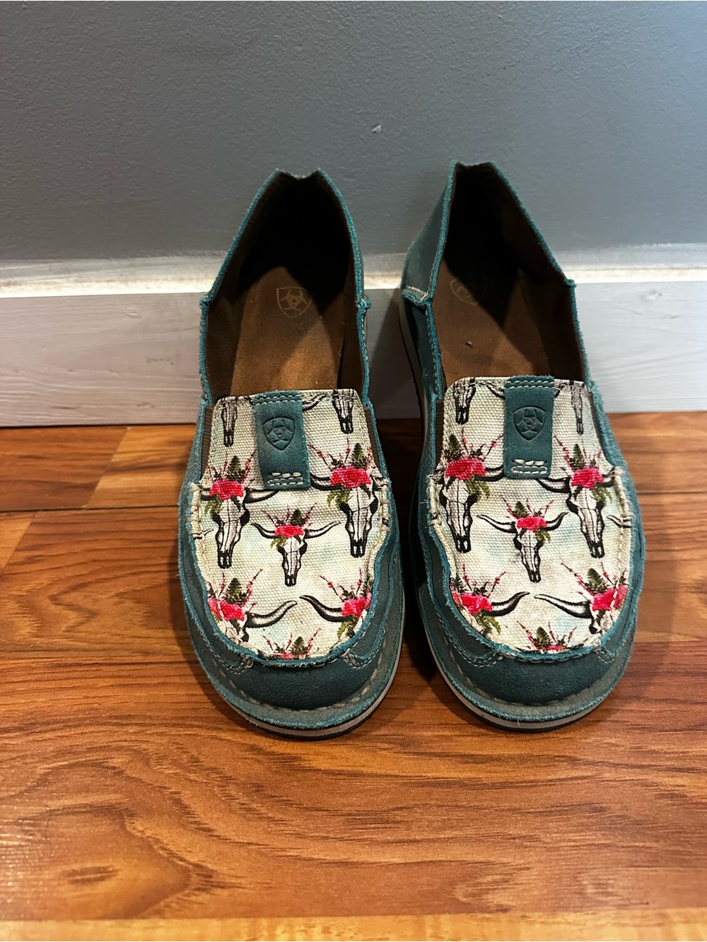 Ariat Teal Slip-On Moccasins with Floral Bull Skull Print